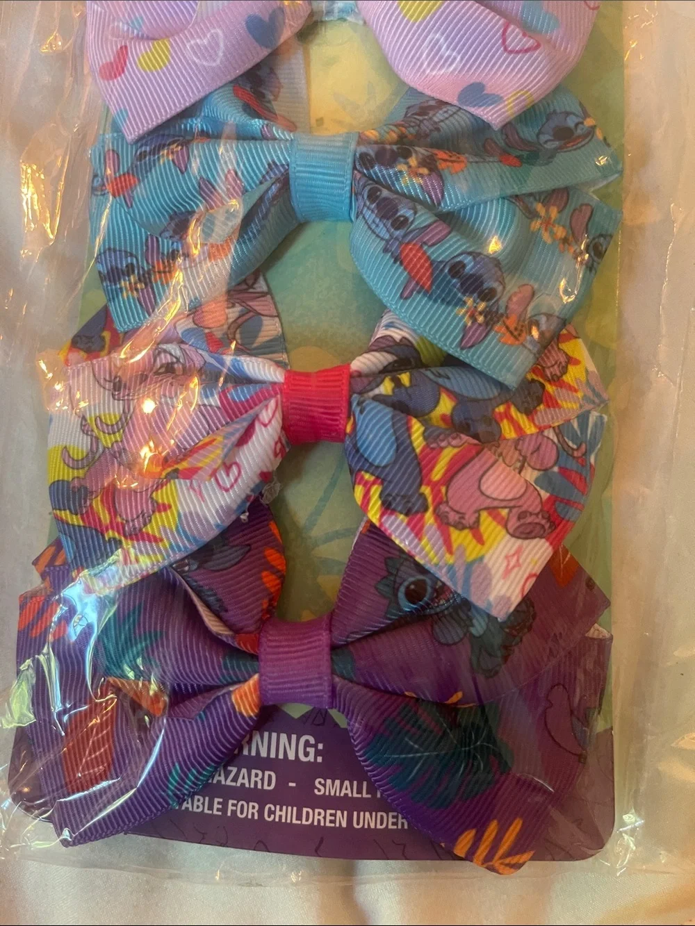 Disney Pastel & Bright Stitch Pattern Bow Clip Set 7 bows nwt